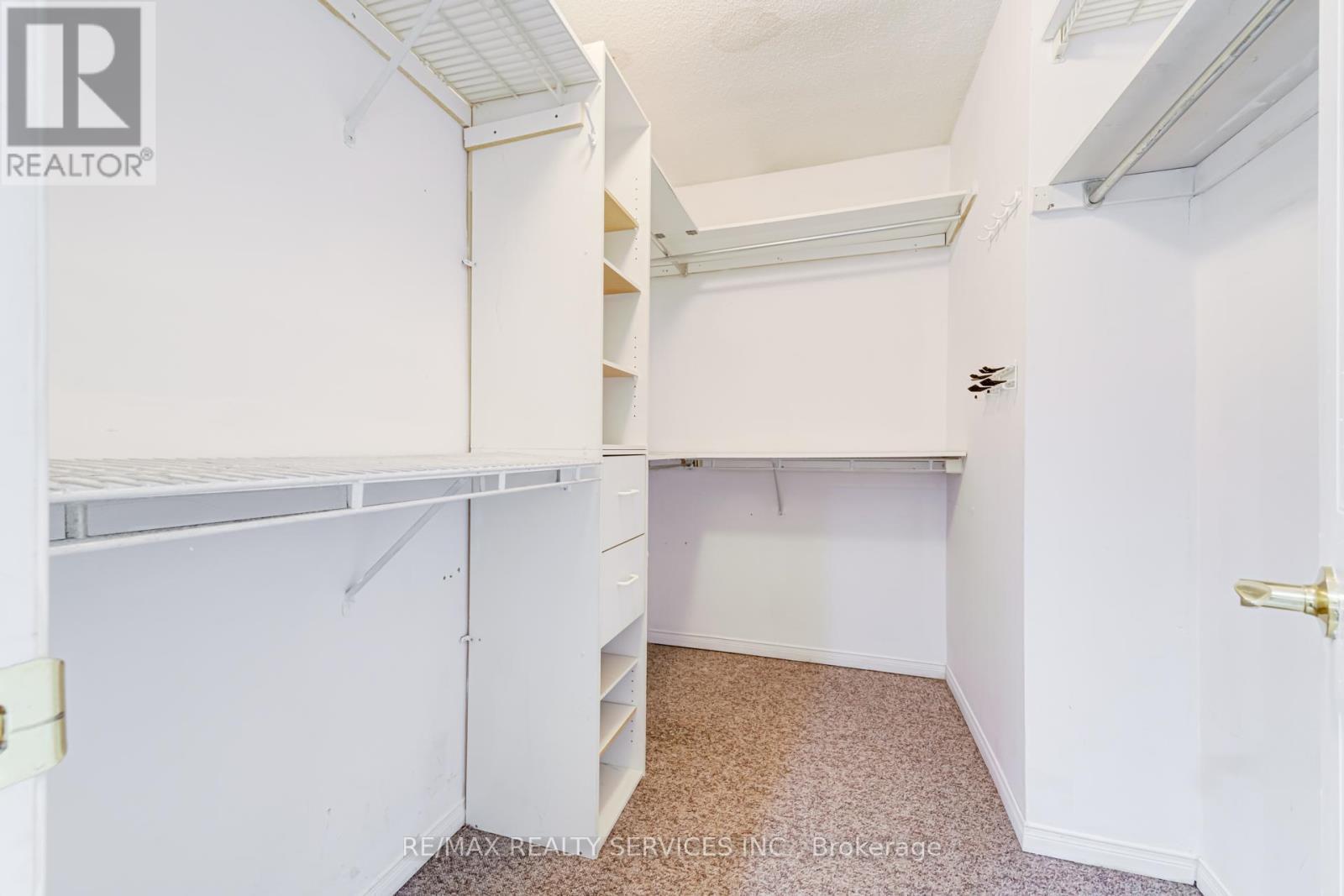 Upper - 4469 Gullfoot Circle, Mississauga, ON - Indoor With Storage