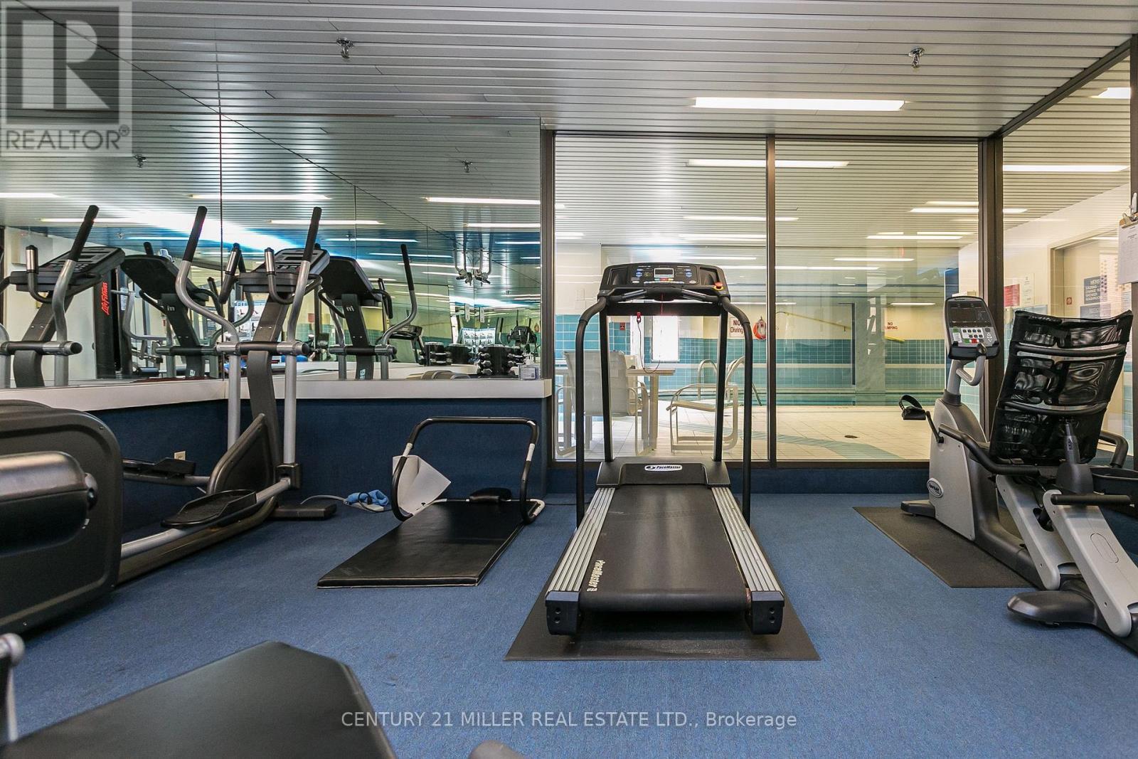 710 - 100 Lakeshore Road E, Oakville, ON - Indoor Photo Showing Gym Room