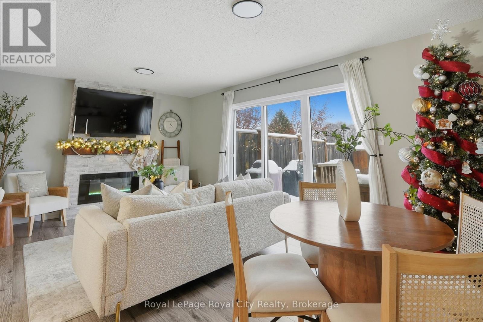 77 Severn Drive, Guelph (Grange Road), ON - Indoor Photo Showing Living Room With Fireplace