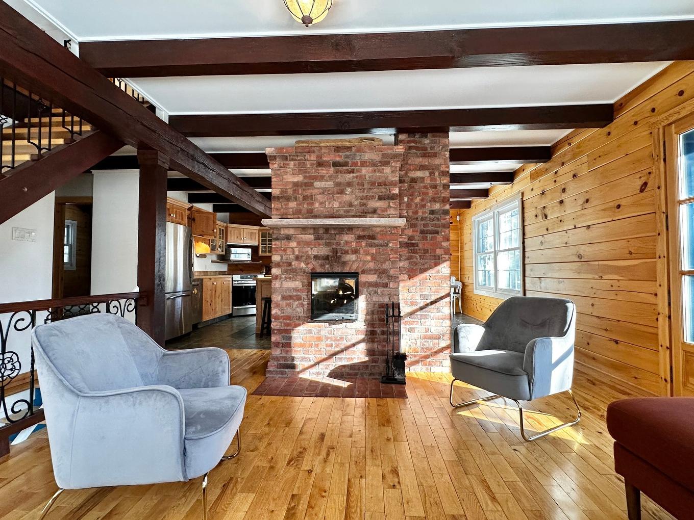 Overall view - 2178 Ch. De La Gare, Val-Morin, QC - Indoor Photo Showing Living Room With Fireplace