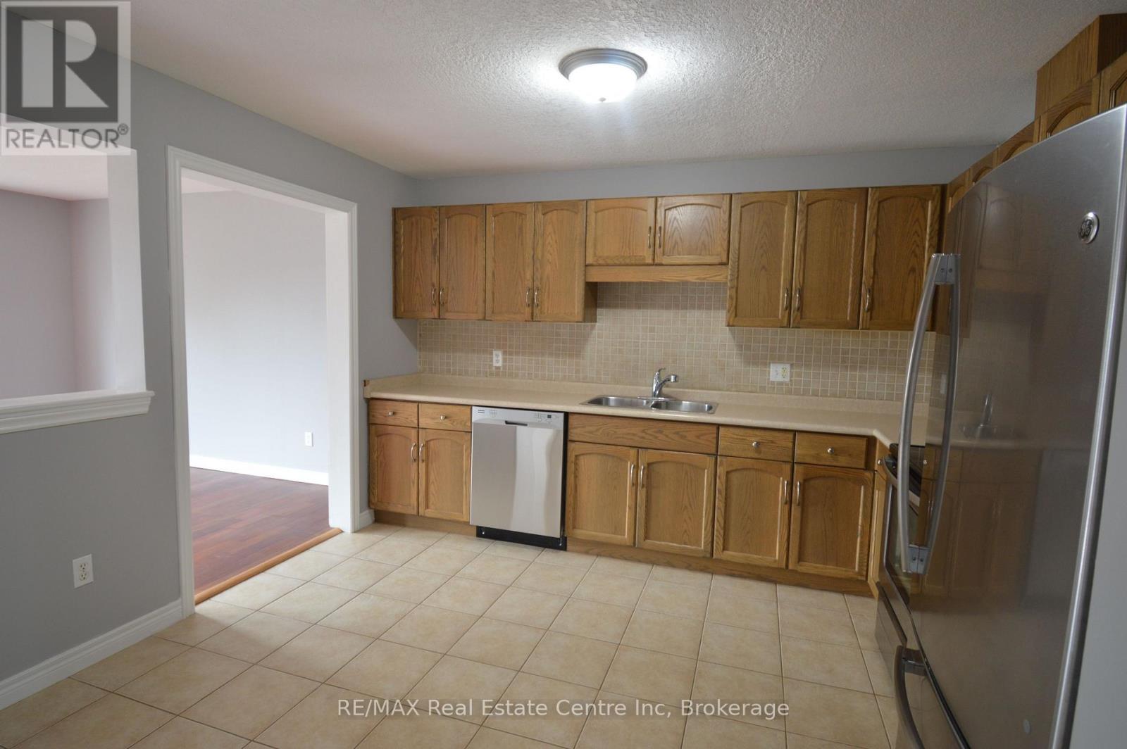 49 Edwards Street, Guelph (Grange Road), ON - Indoor Photo Showing Kitchen With Double Sink