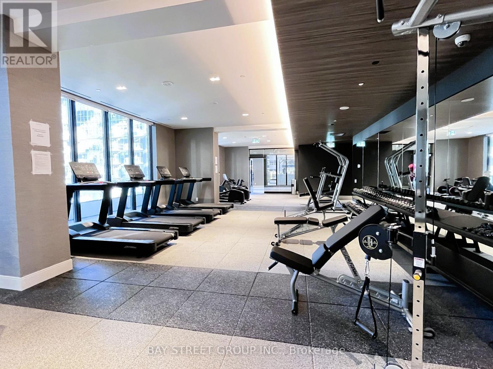 1111 - 65 Broadway Avenue, Toronto, ON - Indoor Photo Showing Gym Room
