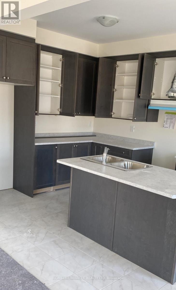 57 North Garden Boulevard, Scugog, ON - Indoor Photo Showing Kitchen With Double Sink