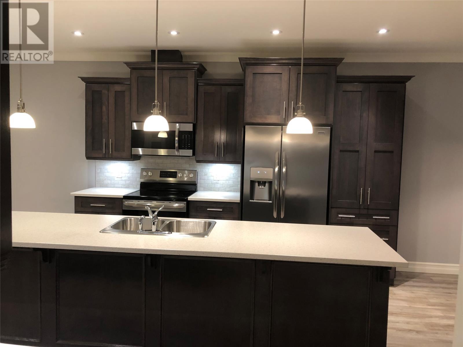 20 Macmar Lane, Conception Bay South, NL - Indoor Photo Showing Kitchen With Double Sink With Upgraded Kitchen