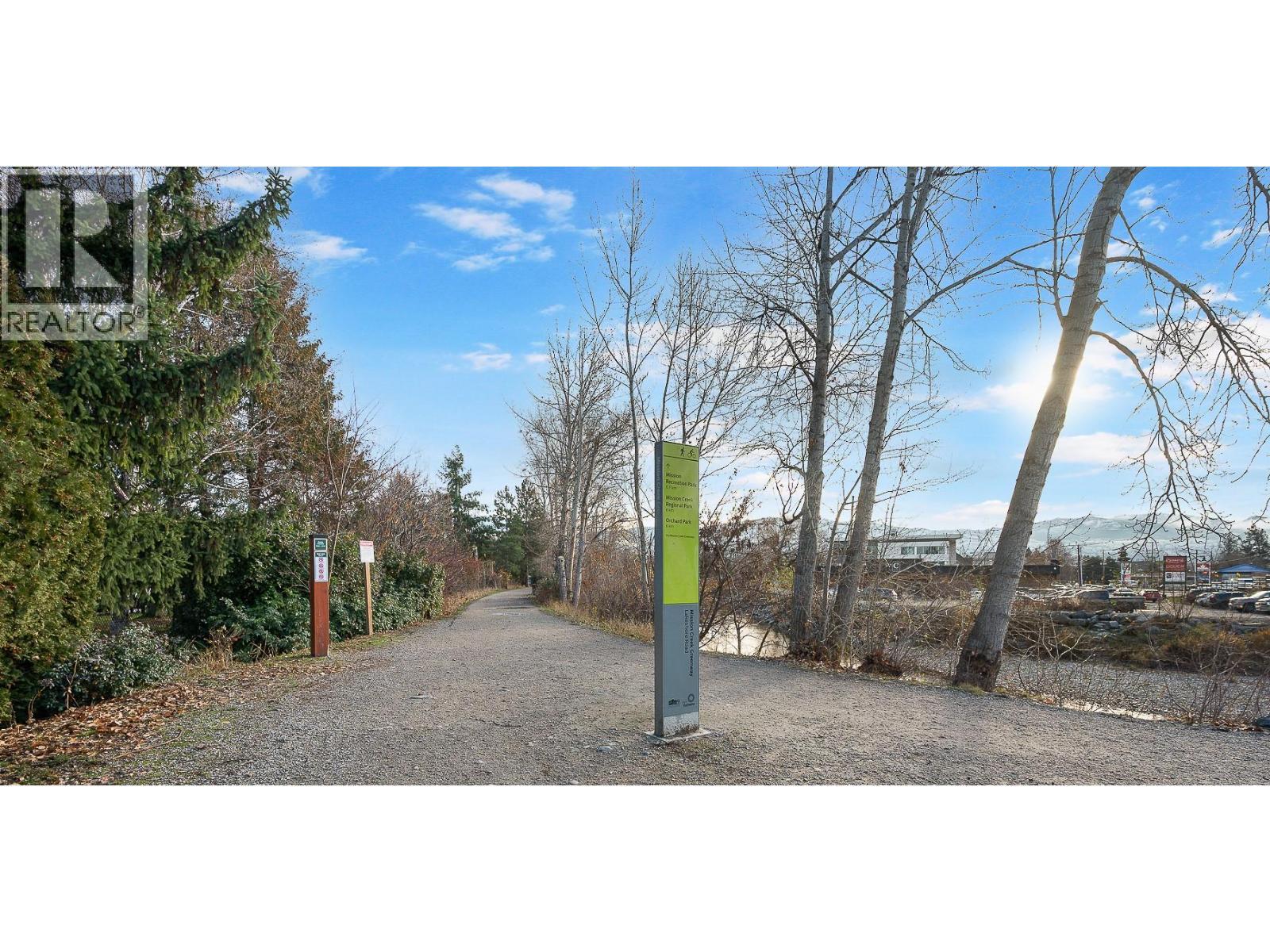 walk out your back yard onto Mission Greenway - 609 Truswell Road Unit# 105, Kelowna, BC - Outdoor With View