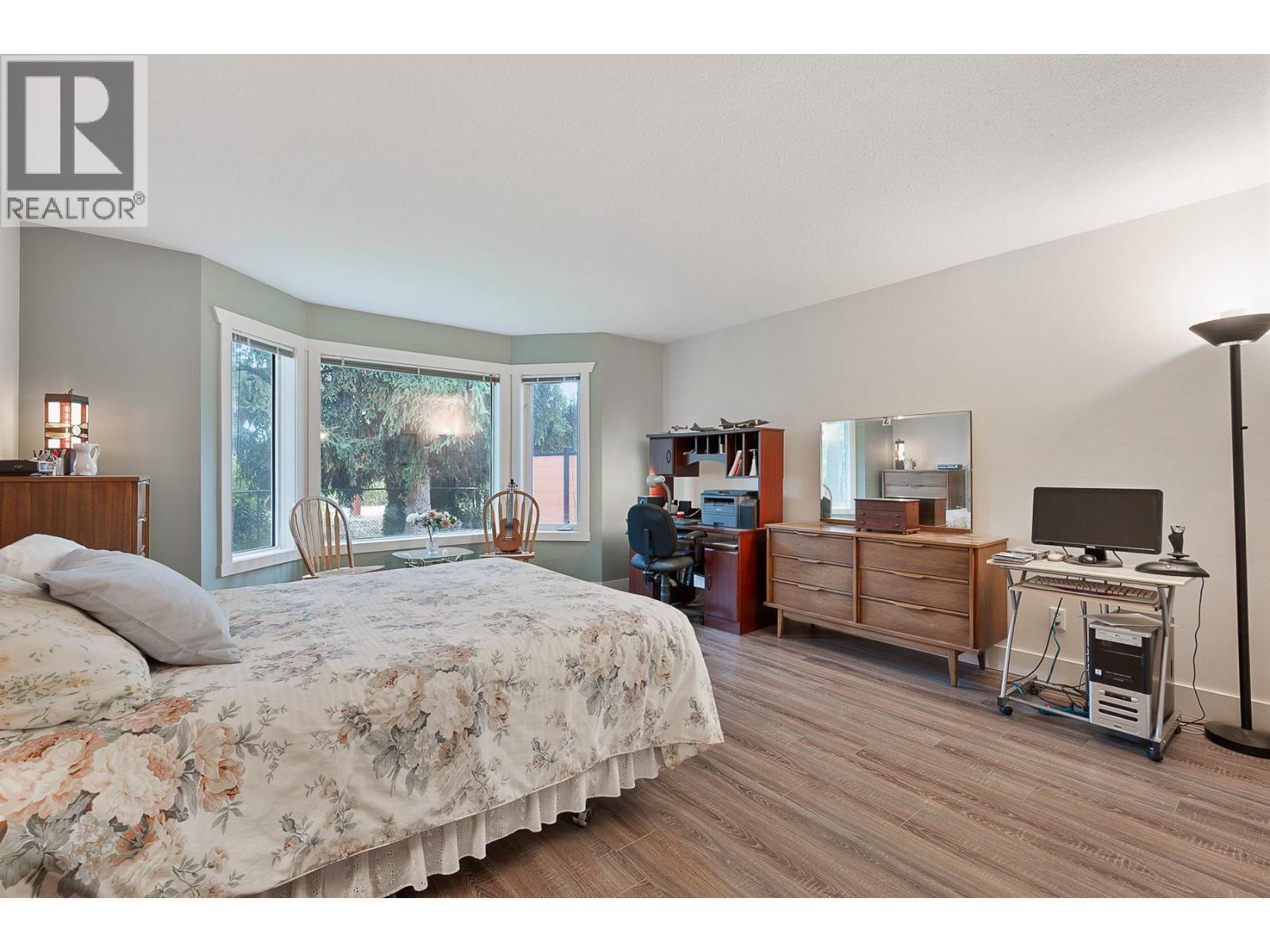 609 Truswell Road Unit# 105, Kelowna, BC - Indoor Photo Showing Bedroom