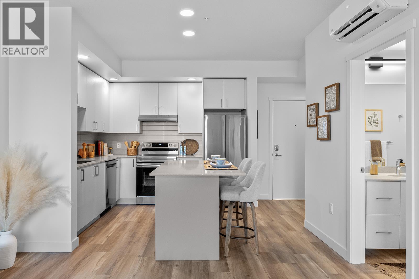 Photos are of a similar home; some features may vary - 1057 Frost Road Unit# 303, Kelowna, BC - Indoor Photo Showing Kitchen With Stainless Steel Kitchen