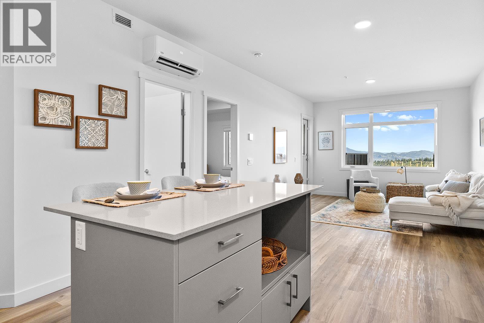 Photos are of a similar home; some features may vary - 1057 Frost Road Unit# 303, Kelowna, BC - Indoor Photo Showing Living Room