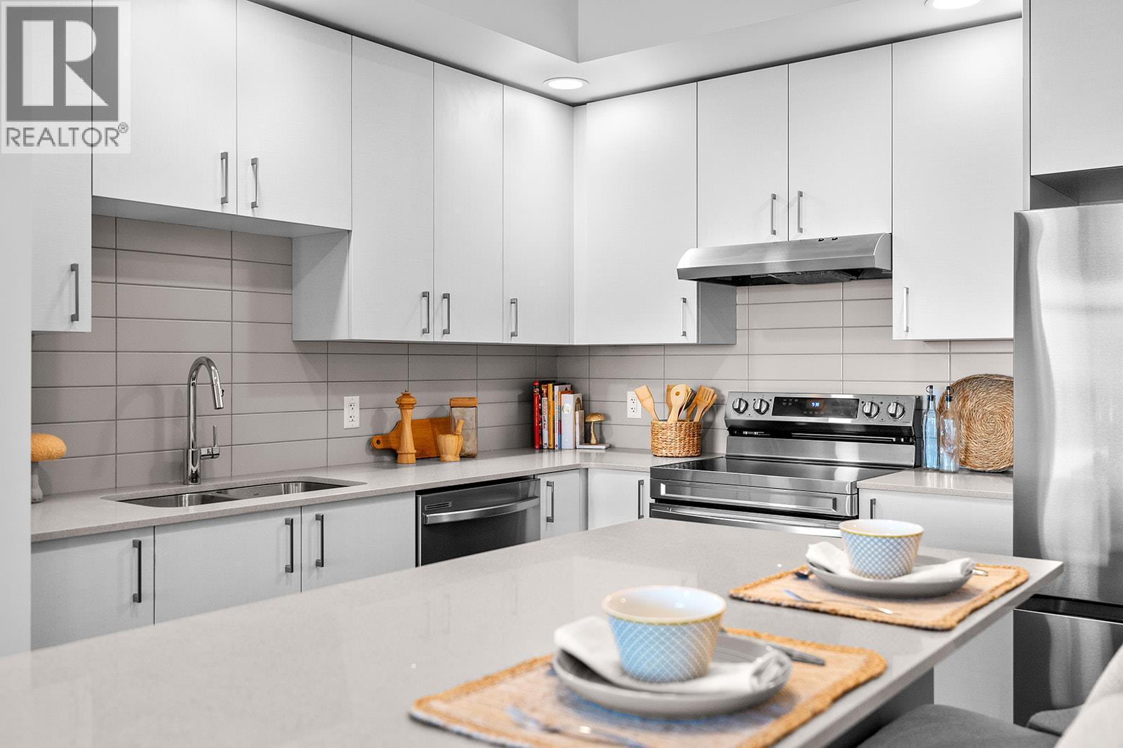 Photos are of a similar home; some features may vary - 1057 Frost Road Unit# 303, Kelowna, BC - Indoor Photo Showing Kitchen With Double Sink With Upgraded Kitchen