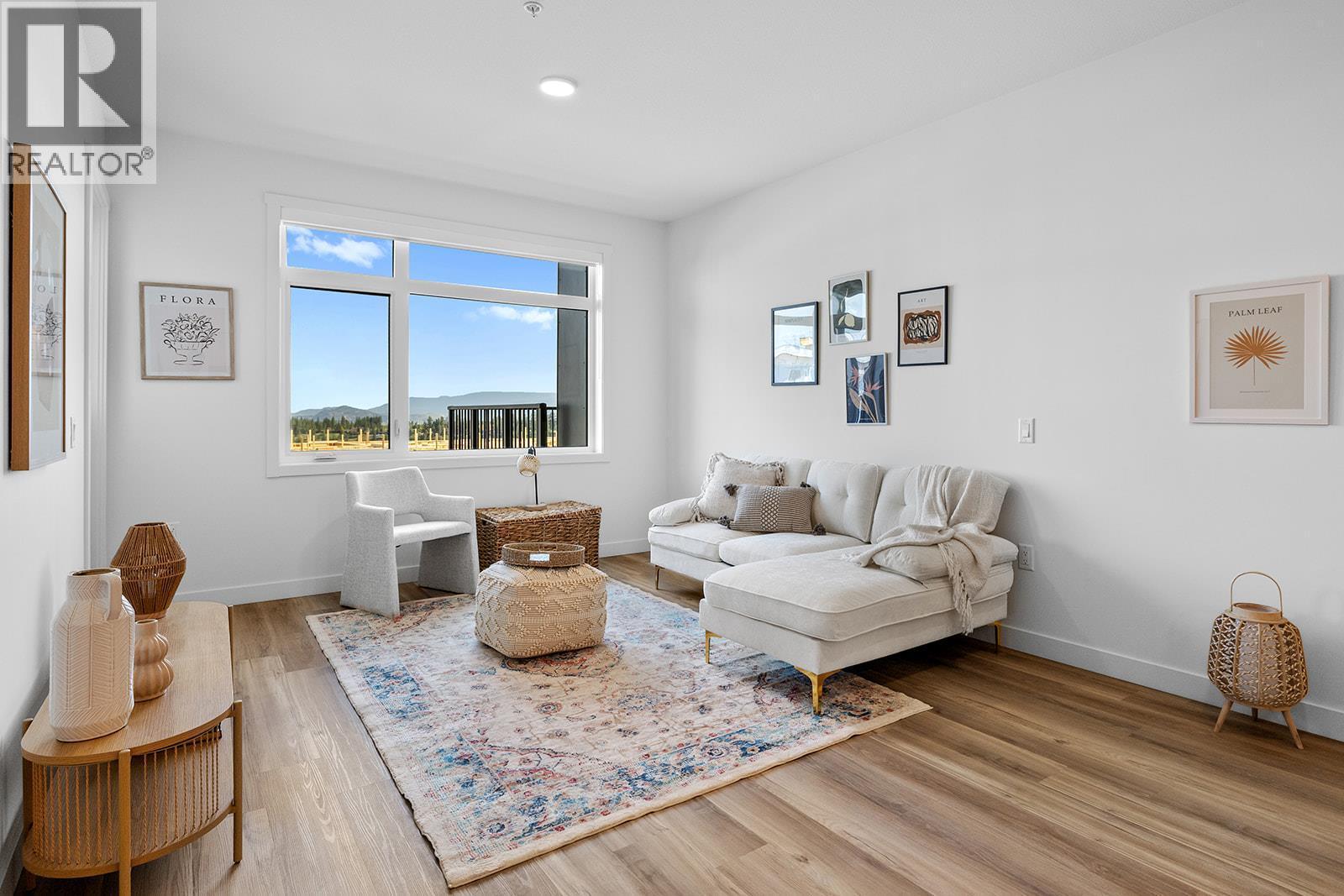 Photos are of a similar home; some features may vary - 1057 Frost Road Unit# 303, Kelowna, BC - Indoor Photo Showing Living Room