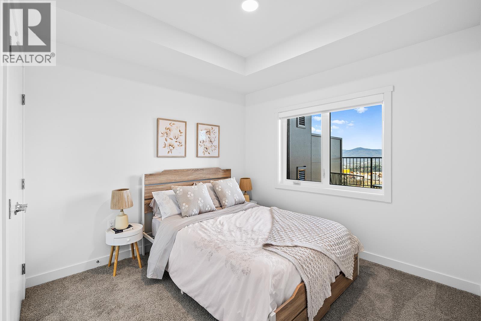 Photos are of a similar home; some features may vary - 1057 Frost Road Unit# 303, Kelowna, BC - Indoor Photo Showing Bedroom