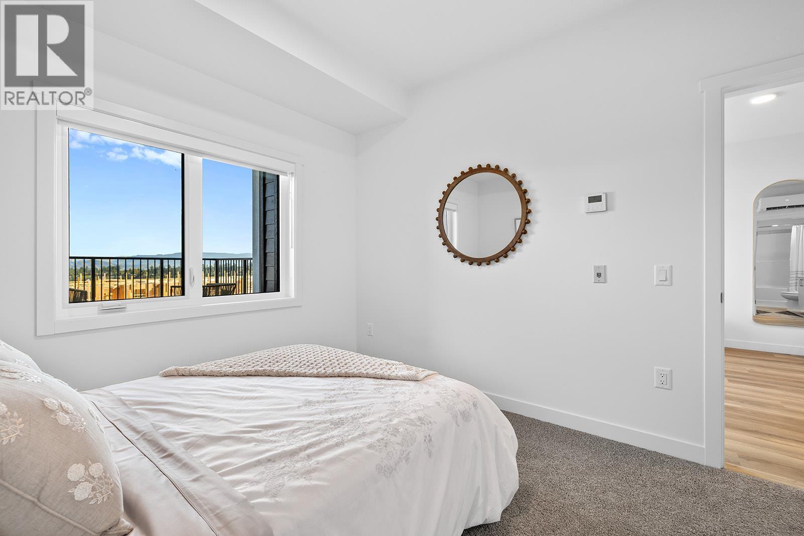 Photos are of a similar home; some features may vary - 1057 Frost Road Unit# 303, Kelowna, BC - Indoor Photo Showing Bedroom