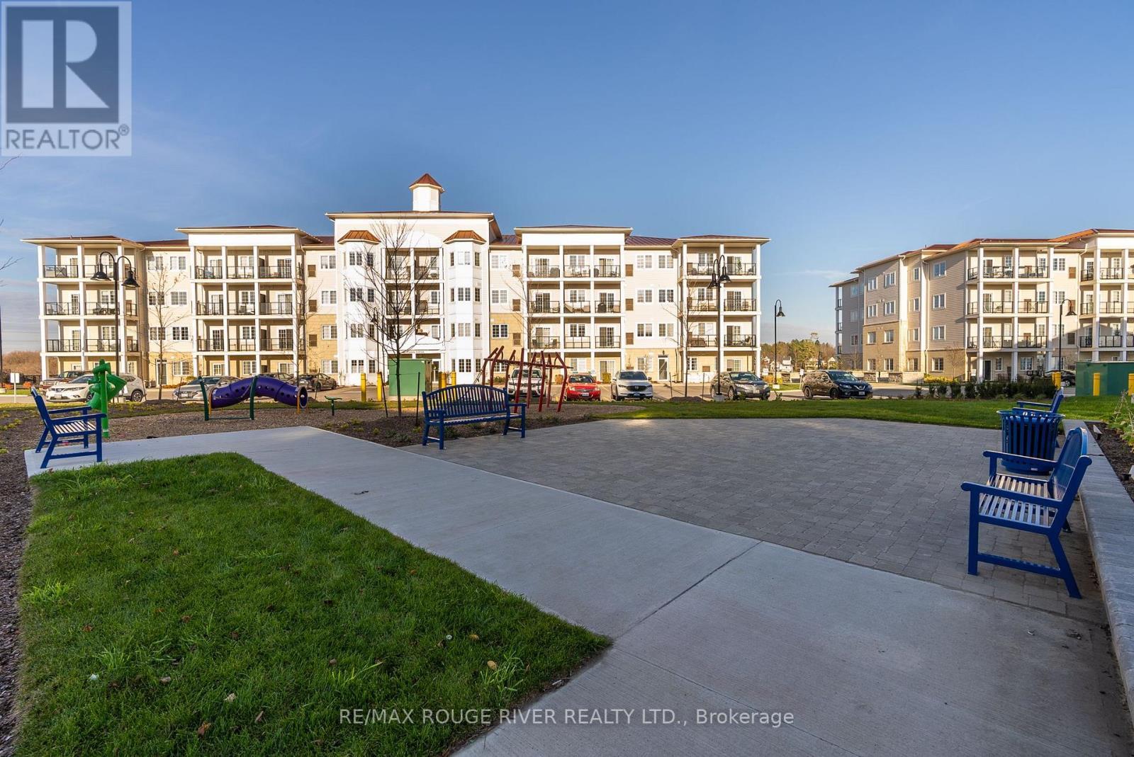 117 - 50 Lakebreeze Drive, Clarington (Newcastle), ON - Outdoor With Facade