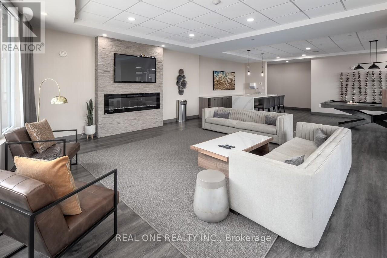 2409 - 20 George Street, Hamilton, ON - Indoor Photo Showing Living Room With Fireplace