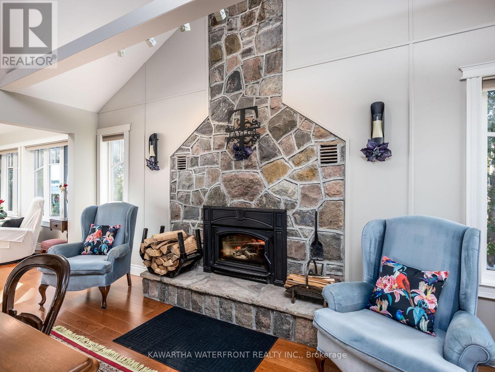 Wood burning fireplace - 48 Maple Avenue, Kawartha Lakes (Bexley), ON - Indoor Photo Showing Living Room With Fireplace