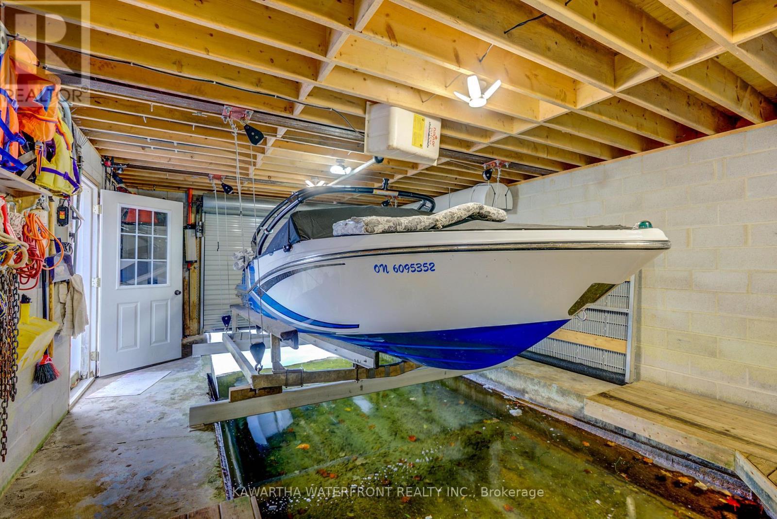 Wet Slip Boathouse - 48 Maple Avenue, Kawartha Lakes (Bexley), ON - Indoor Photo Showing Basement