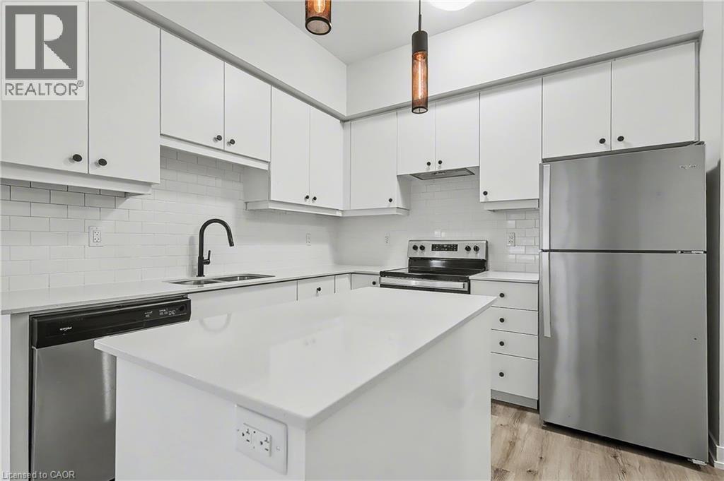 251 Northfield Drive E Unit# 103, Waterloo, ON - Indoor Photo Showing Kitchen With Stainless Steel Kitchen With Double Sink With Upgraded Kitchen