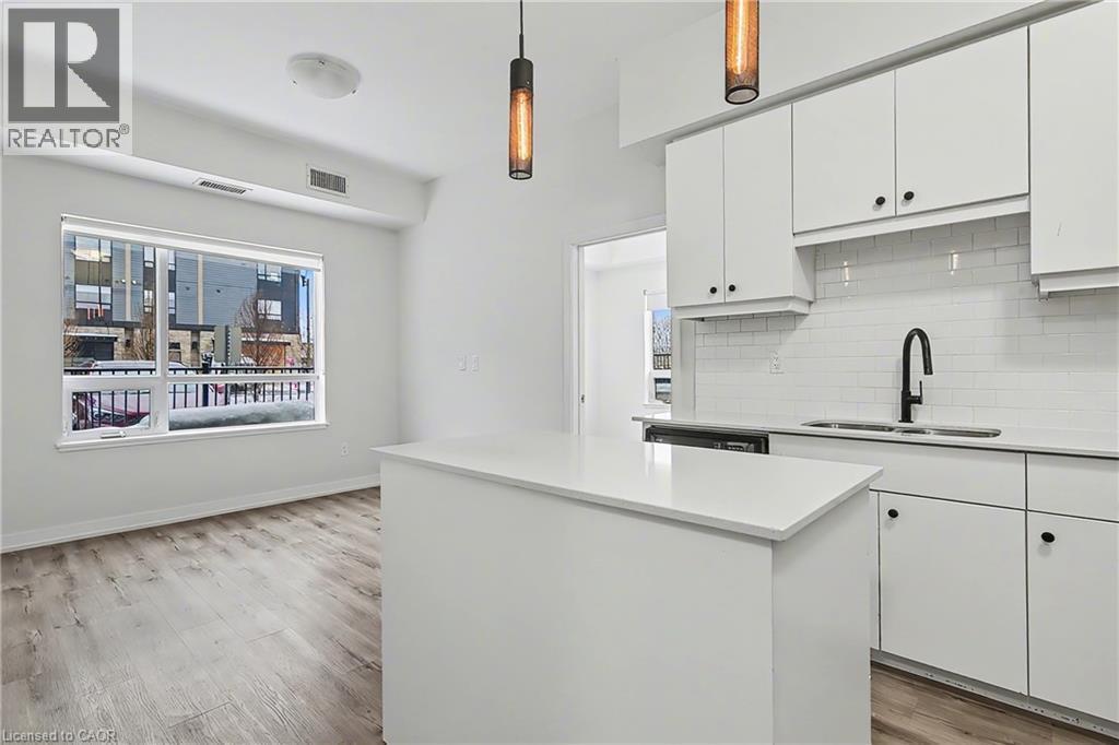 251 Northfield Drive E Unit# 103, Waterloo, ON - Indoor Photo Showing Kitchen With Double Sink With Upgraded Kitchen