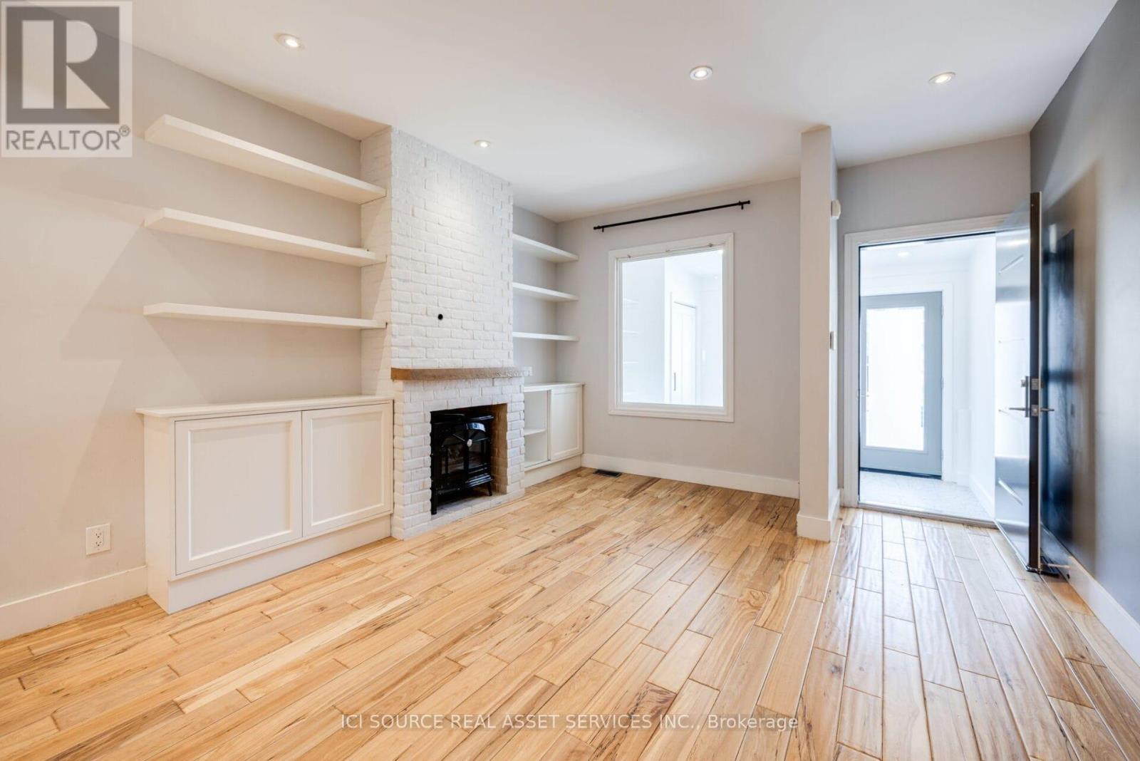 Main - 24 Pape Avenue, Toronto, ON - Indoor With Fireplace