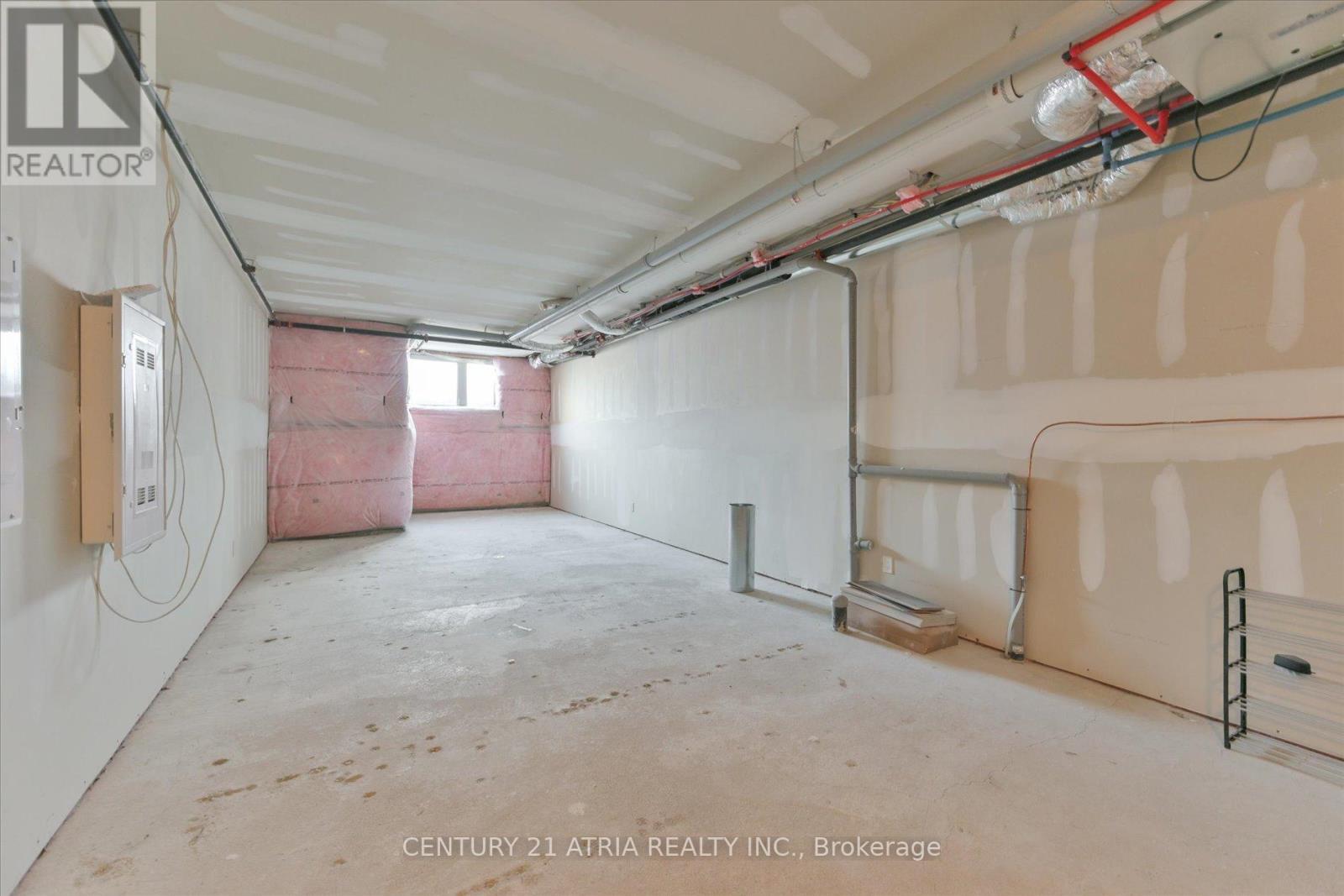 111 - 2100 Bridletowne Circle, Toronto, ON - Indoor Photo Showing Garage