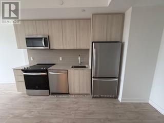 313 - 720 Whitlock Avenue, Milton, ON - Indoor Photo Showing Kitchen With Stainless Steel Kitchen