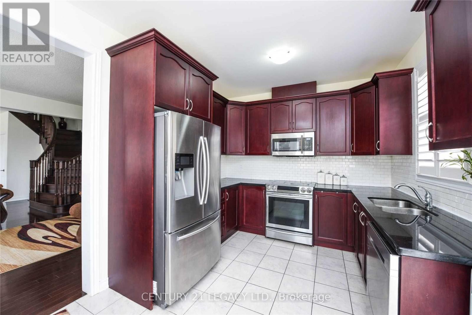 73 Buchanan Crescent, Brampton, ON - Indoor Photo Showing Kitchen With Stainless Steel Kitchen With Double Sink
