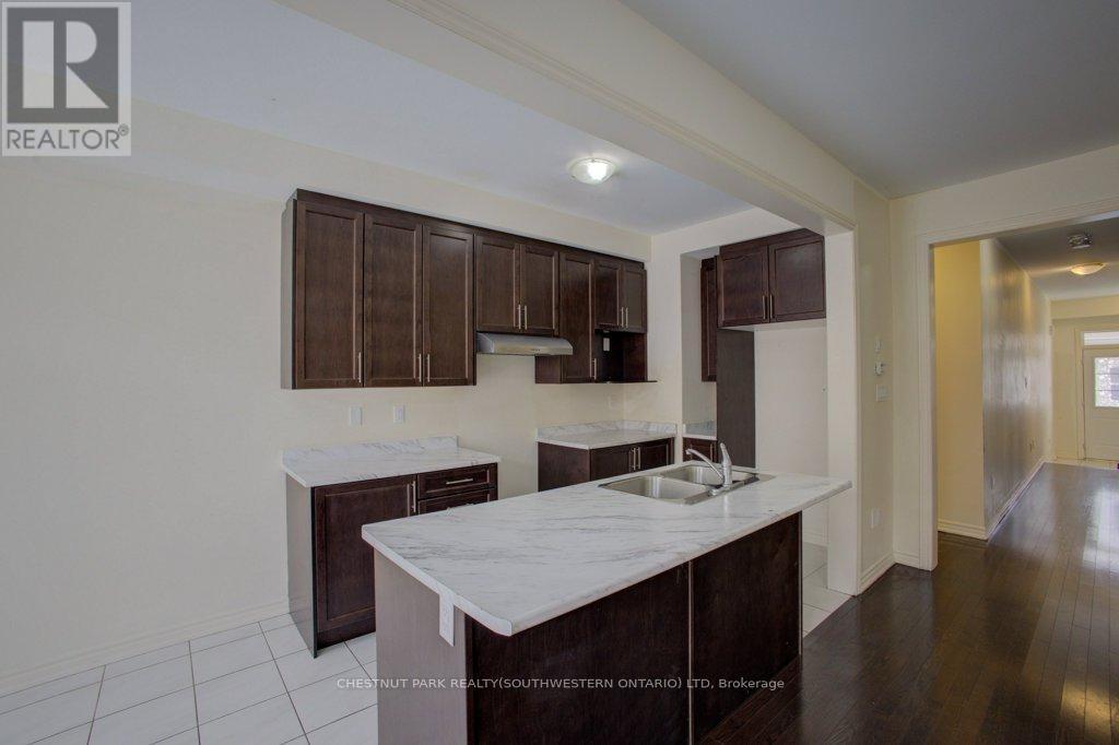 5 Donald Ficht Crescent, Brampton, ON - Indoor Photo Showing Kitchen With Double Sink