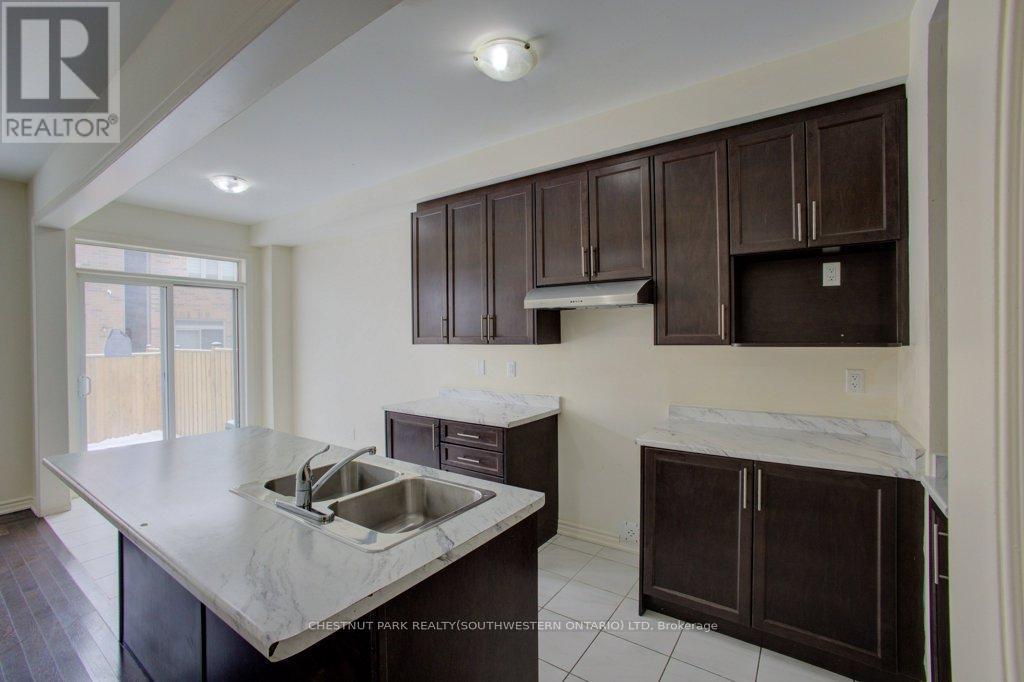 5 Donald Ficht Crescent, Brampton, ON - Indoor Photo Showing Kitchen With Double Sink