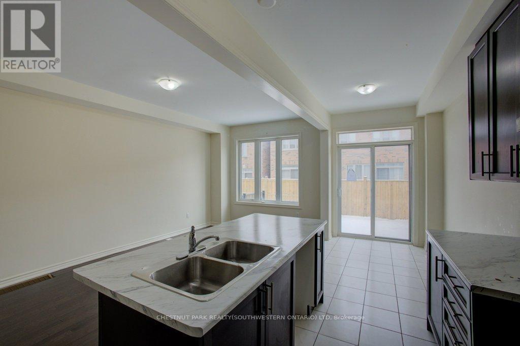 5 Donald Ficht Crescent, Brampton, ON - Indoor Photo Showing Kitchen With Double Sink