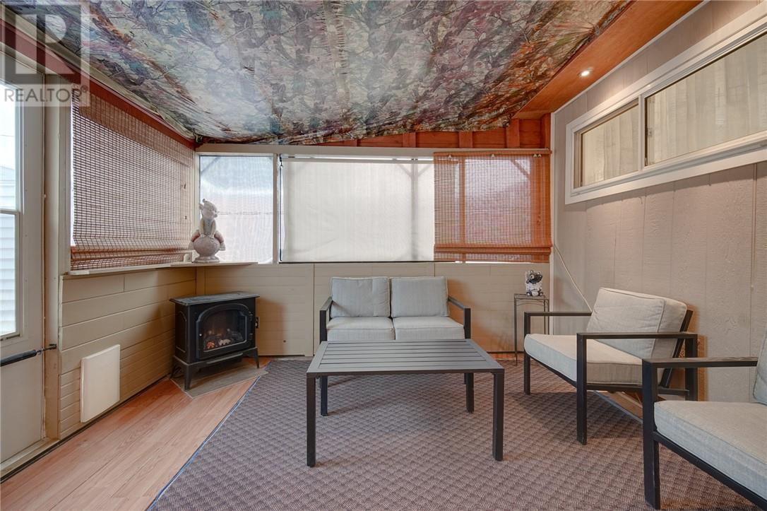 411 Black Lake Road Unit# 15, Lively, ON - Indoor Photo Showing Other Room With Fireplace