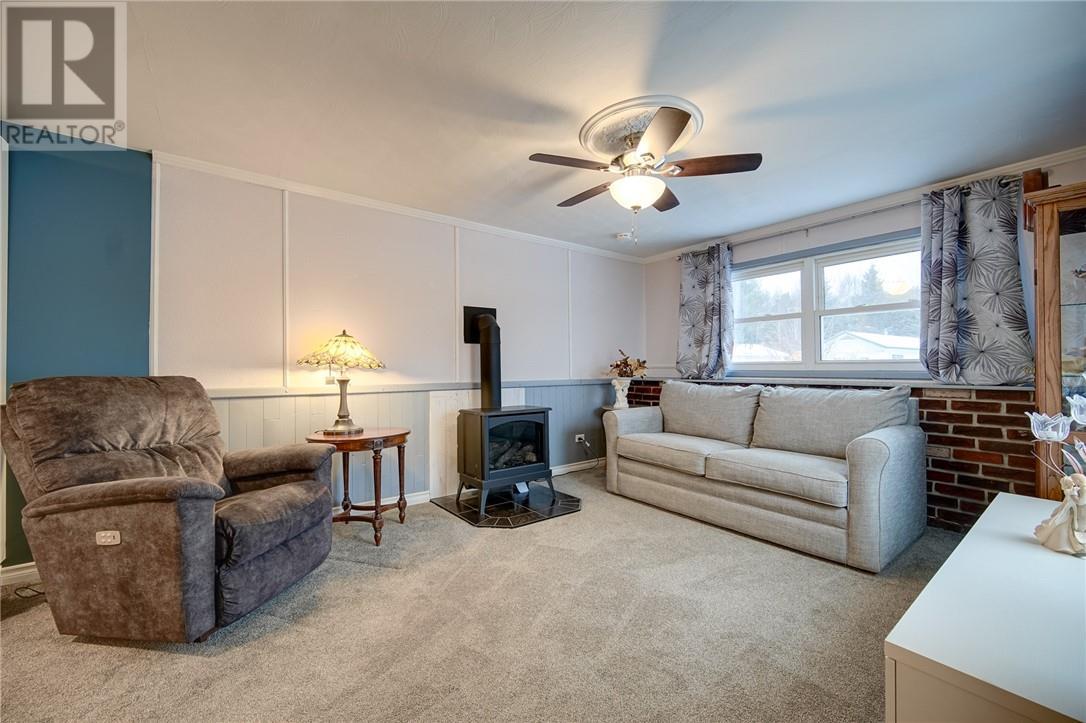 411 Black Lake Road Unit# 15, Lively, ON - Indoor Photo Showing Living Room With Fireplace