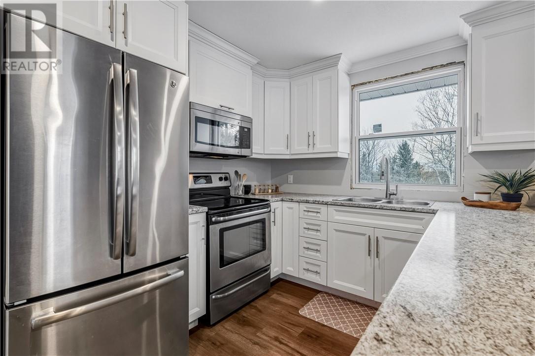 22 Sandra Street, Garson, ON - Indoor Photo Showing Kitchen With Double Sink