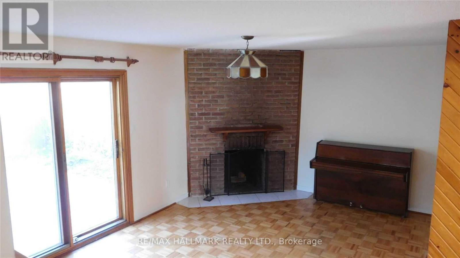 22 Springhead Gardens, Richmond Hill, ON - Indoor Photo Showing Other Room With Fireplace