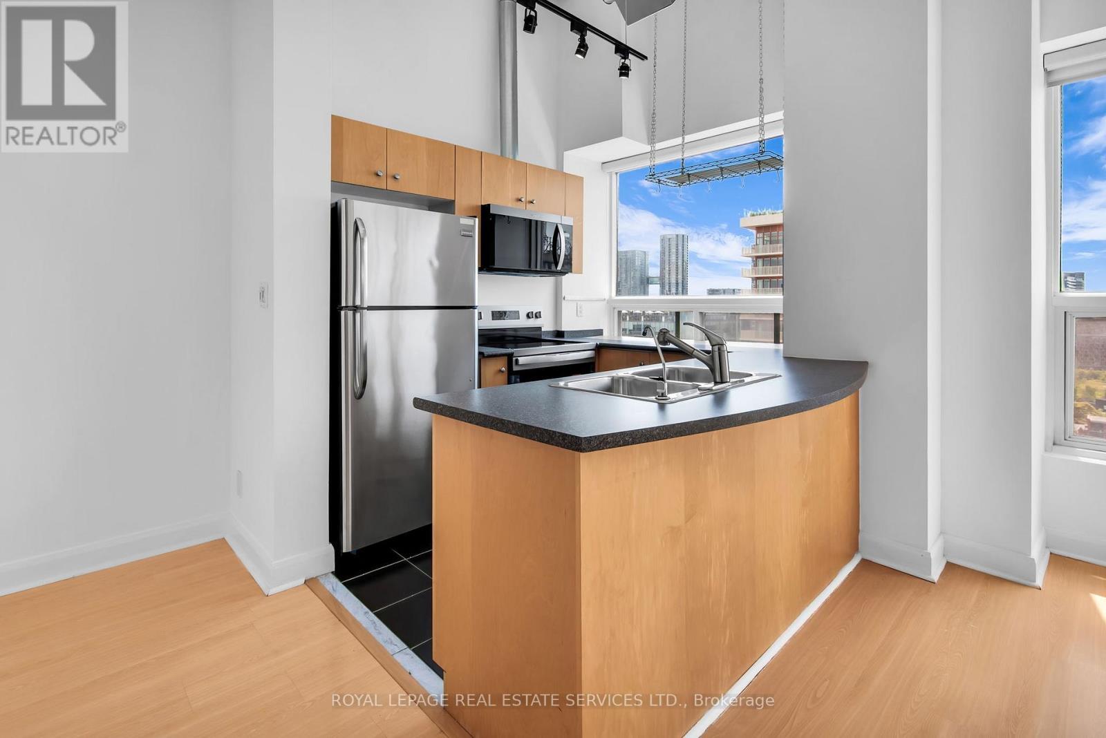 Ph13 - 700 King Street W, Toronto, ON - Indoor Photo Showing Kitchen With Double Sink