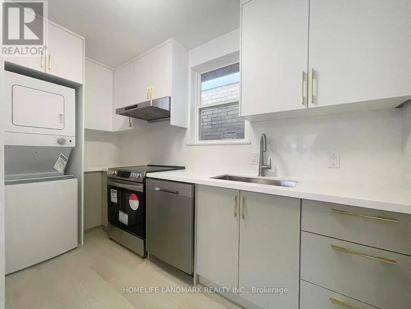 Upper - 544 Indian Road, Toronto, ON - Indoor Photo Showing Laundry Room