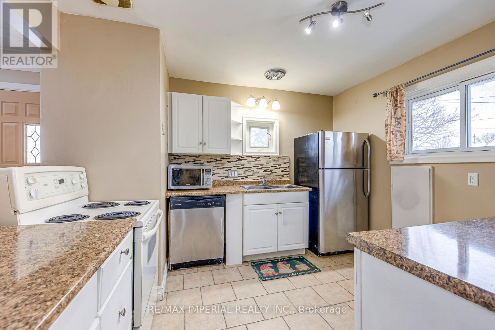 Main - 456 East 13Th Street, Hamilton, ON - Indoor Photo Showing Kitchen With Double Sink