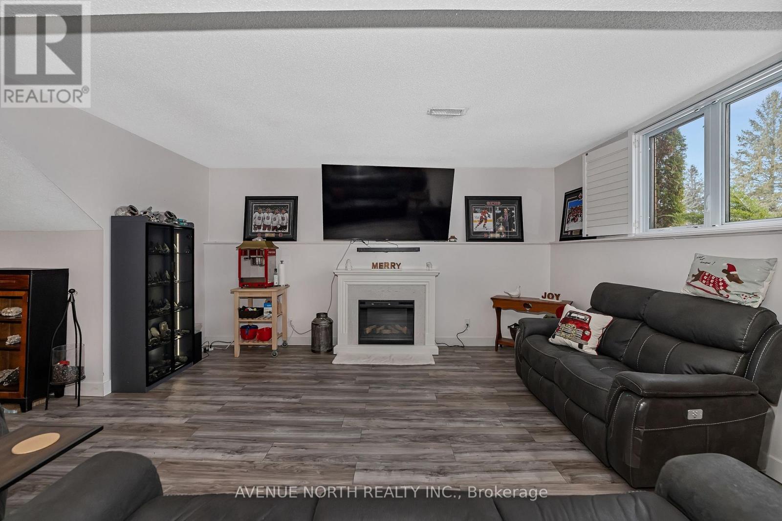 7028 Shadow Ridge Drive, Ottawa, ON - Indoor Photo Showing Living Room With Fireplace