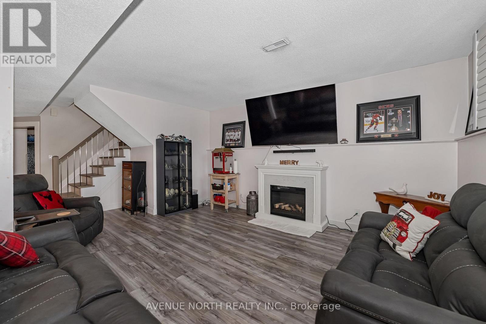 7028 Shadow Ridge Drive, Ottawa, ON - Indoor Photo Showing Living Room With Fireplace