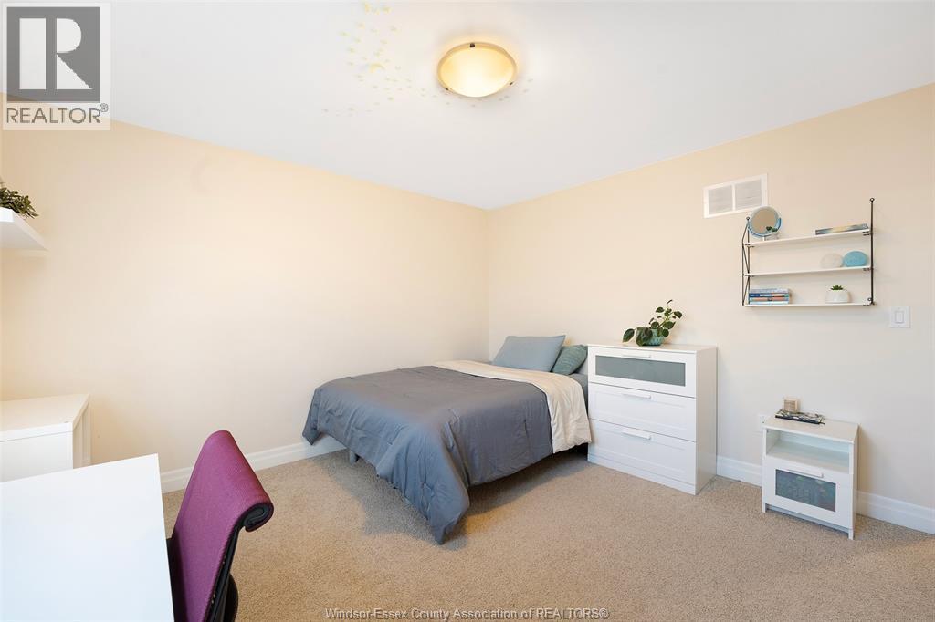1345 Deer Run Trail, Lakeshore, ON - Indoor Photo Showing Bedroom