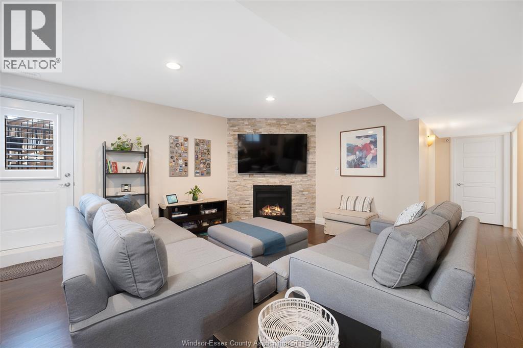 1345 Deer Run Trail, Lakeshore, ON - Indoor Photo Showing Living Room With Fireplace