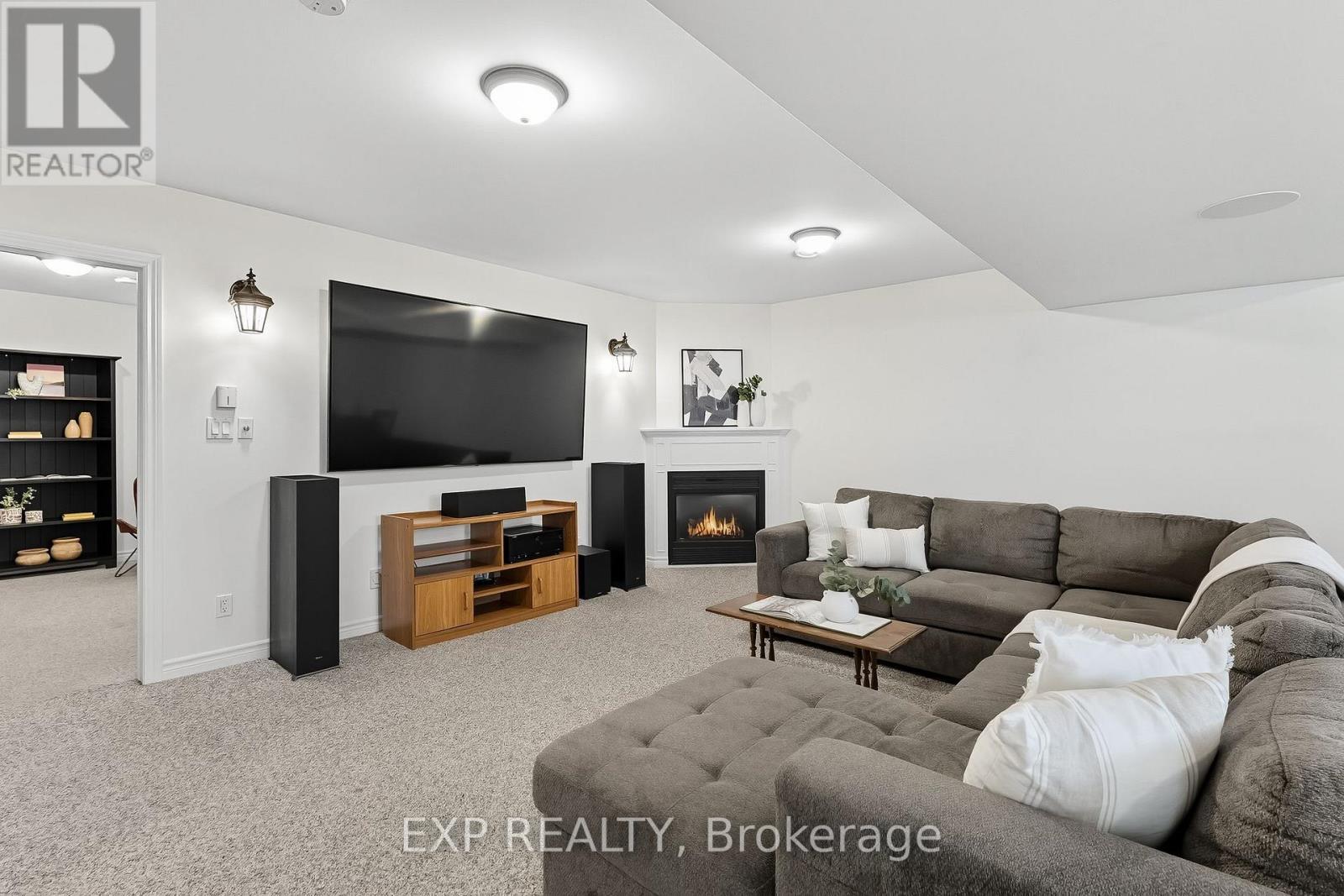 9 Lucas Court, Brighton, ON - Indoor Photo Showing Living Room With Fireplace