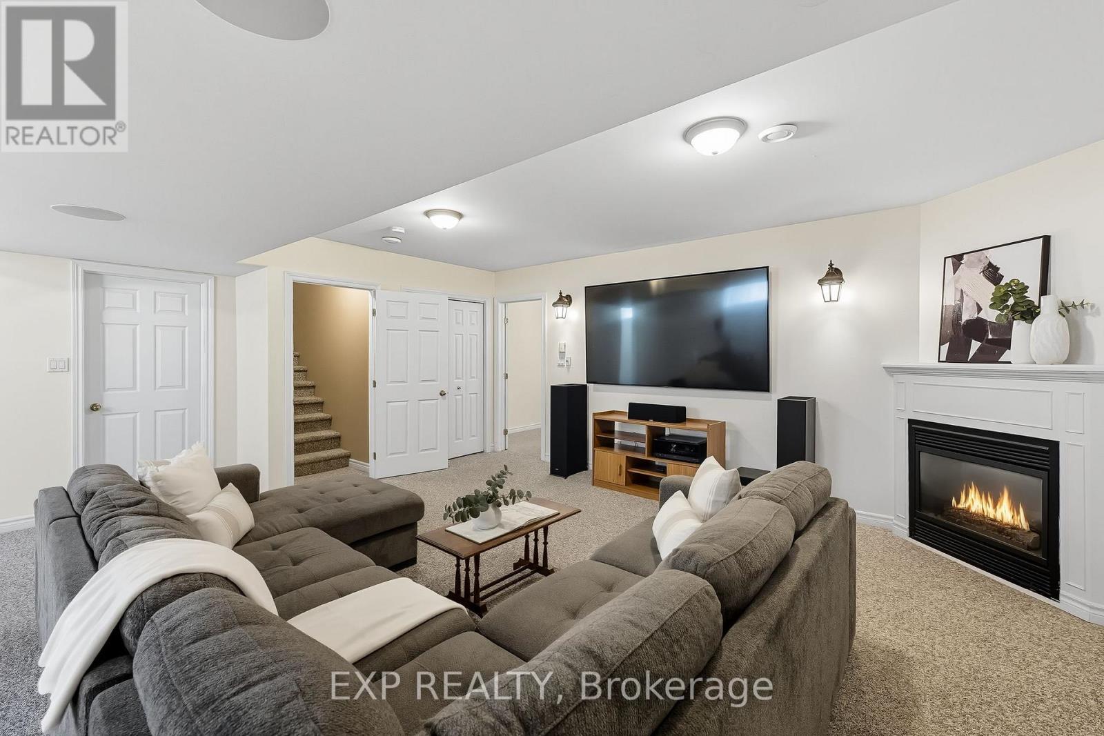 9 Lucas Court, Brighton, ON - Indoor Photo Showing Living Room With Fireplace