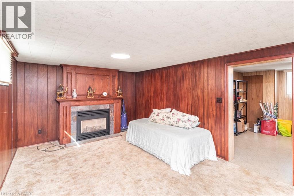 176 Walter Avenue S, Hamilton, ON - Indoor With Fireplace