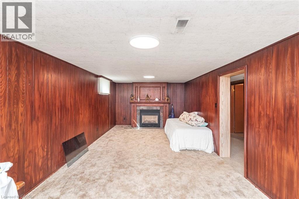 176 Walter Avenue S, Hamilton, ON - Indoor With Fireplace