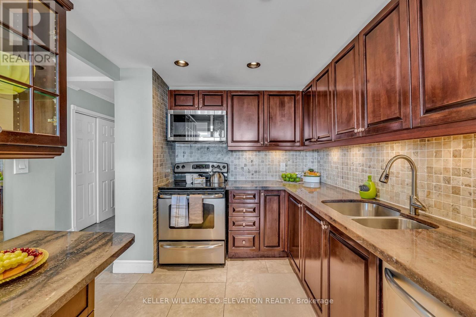 702 - 14 Neilson Drive, Toronto, ON - Indoor Photo Showing Kitchen With Double Sink