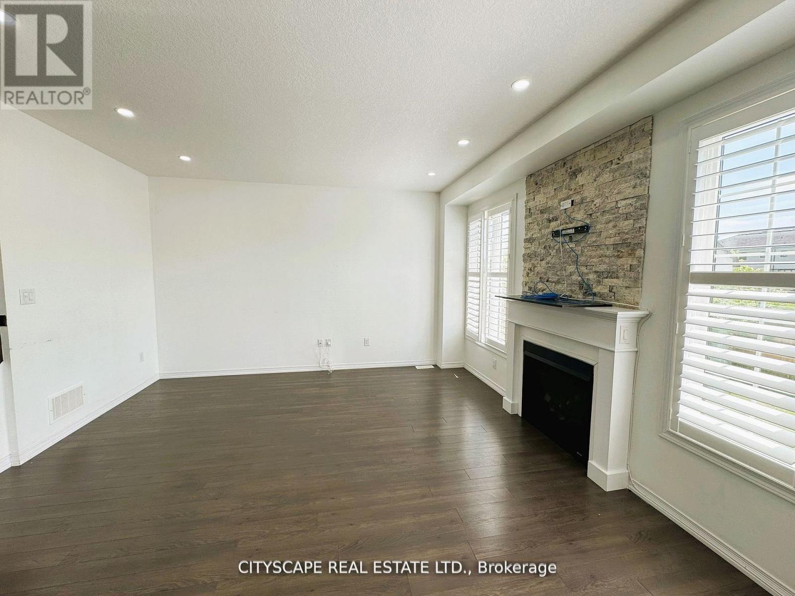 Family Room - 7646 Goldenrod Trail, Niagara Falls, ON - Indoor With Fireplace