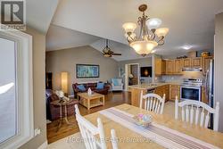 Dining Room view to Living Room, Cathedral ceiling -