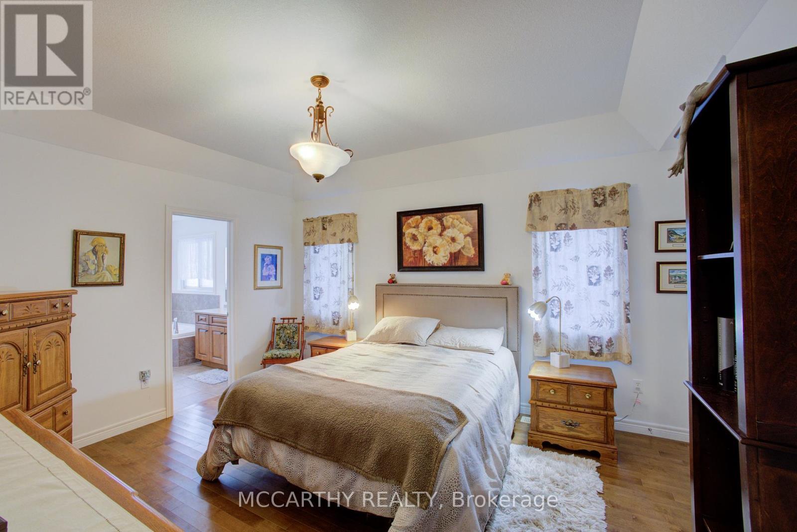 Primary Bedrrom with Ensuite - 125 Sheffield Street, Southgate, ON - Indoor Photo Showing Bedroom