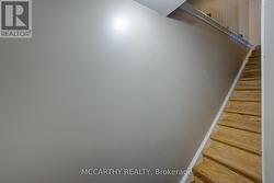 Hardwood wood stairs to finished basement -
