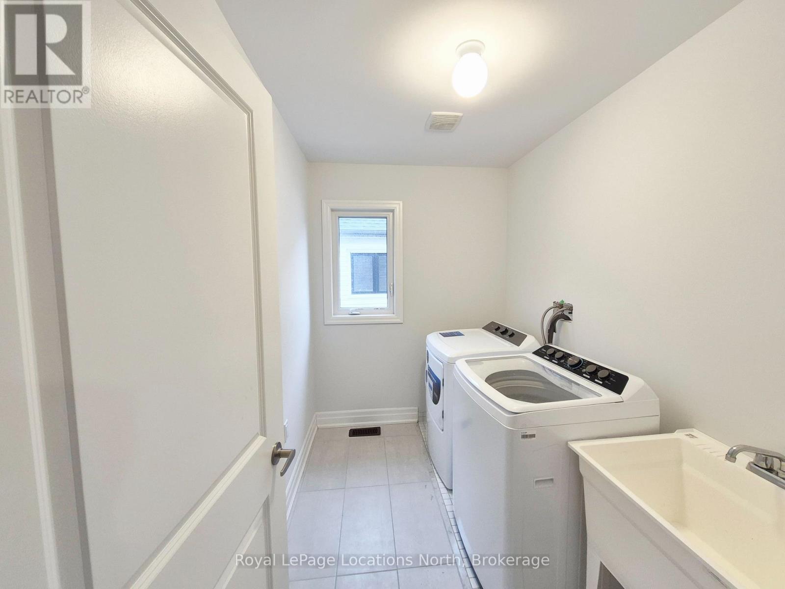 Laundry upstairs - 158 Union Boulevard, Wasaga Beach, ON - Indoor Photo Showing Laundry Room